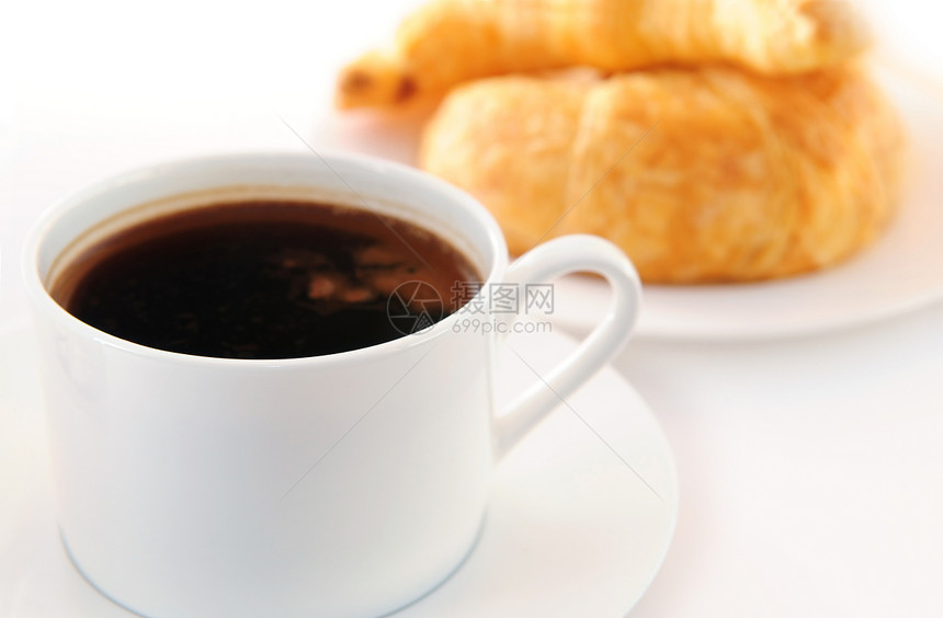 咖啡和羊角面包飞碟餐厅咖啡店盘子小吃甜点杯子早餐白色黑色图片
