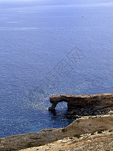 地中海石石拱蓝色海岸天蓝色海洋拱道天顶医学场景地平线岩石背景图片