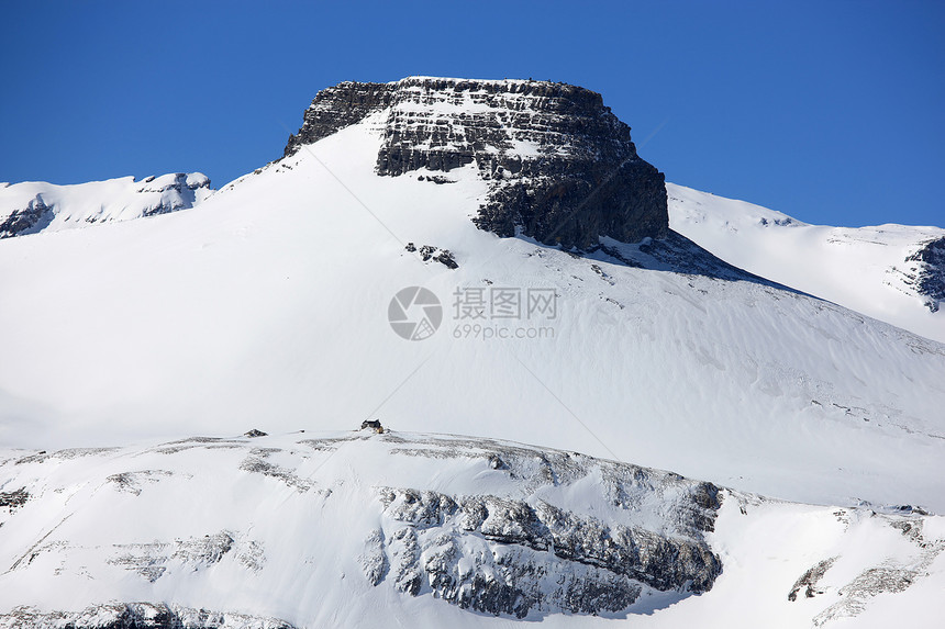 冬季瑞士山峰季节岩石天空顶峰地质学地平线全景蓝色风景爬坡图片