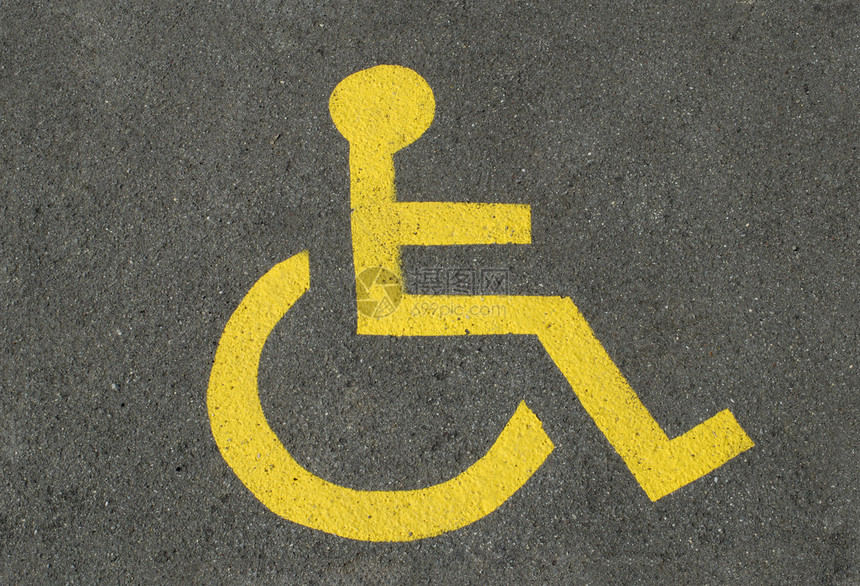 残疾人泊车车轮灰色沥青石质石头黄色汽车公园停车场轮椅图片