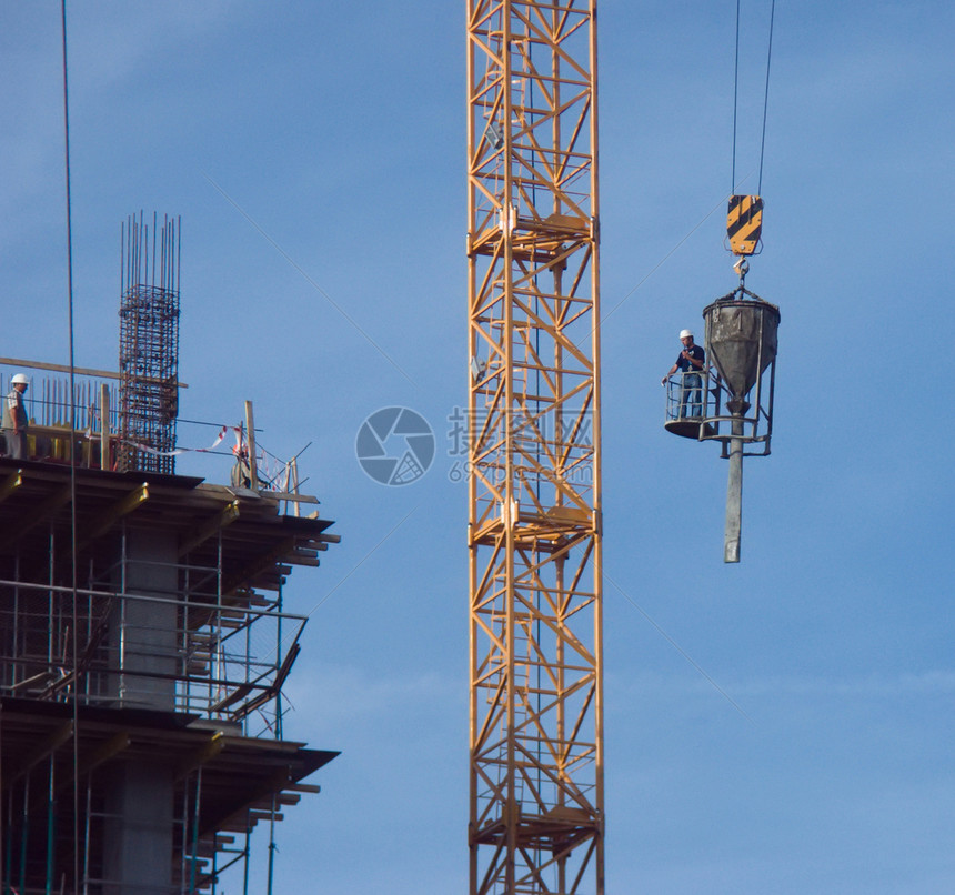 建筑工地职业工作千斤顶尖顶建造起重机天空索具黄色摩天大楼图片