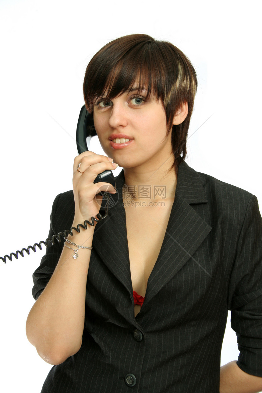 年轻可爱的姑娘笑着用电话说话角色办公室服务成人女孩们商务帮助秘书讲话呼唤图片