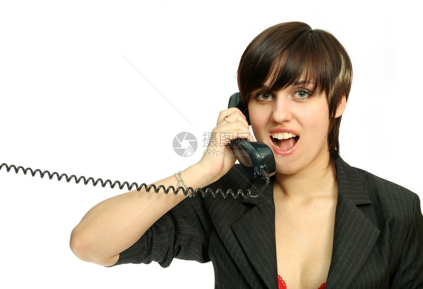 年轻可爱的姑娘笑着用电话说话微笑秘书商务快乐女性人士呼唤成人幸福商业图片