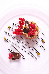 巧克力甜点坚果玻璃棕色开心果山珍海味浆果红色绿色曲线盘子背景图片