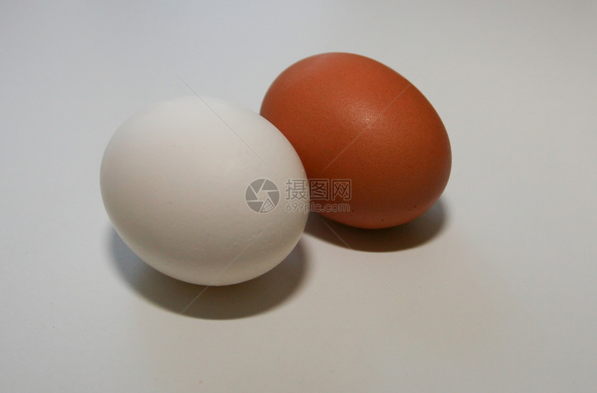 两个鸡蛋宏观斑点早餐食物棕色营养钥匙母鸡白色家禽图片
