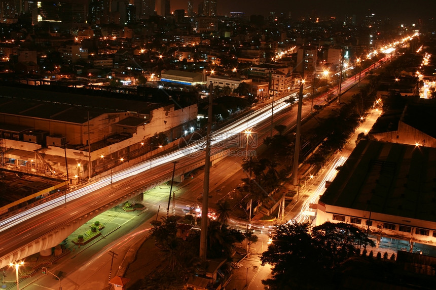 夜间的城市风景立交桥运动路口景观辉光交通旅行建筑物街道速度图片