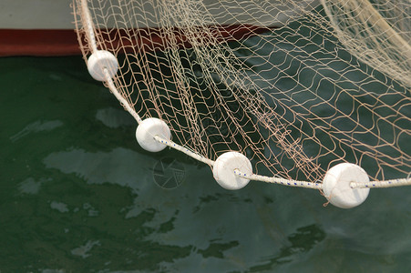 鱼网橙子草稿投掷工具细绳网状物绳索海洋钓鱼流网高清图片