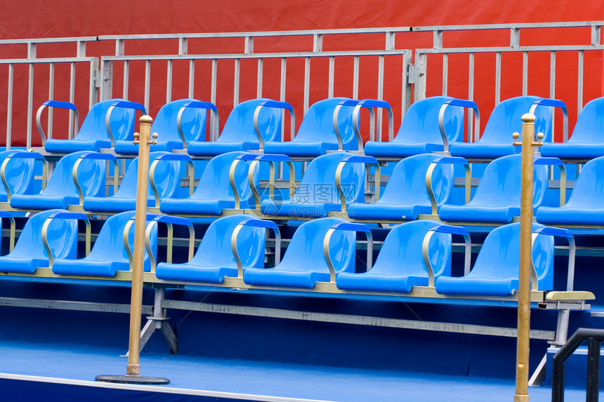 蓝椅运动蓝色红色论坛政治体育场摊位图片