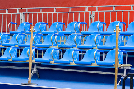 蓝椅运动蓝色红色论坛政治体育场摊位背景图片
