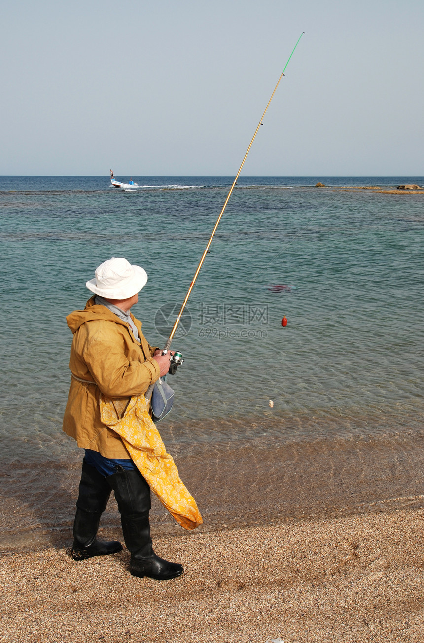 渔夫海滩钓鱼海岸线图片