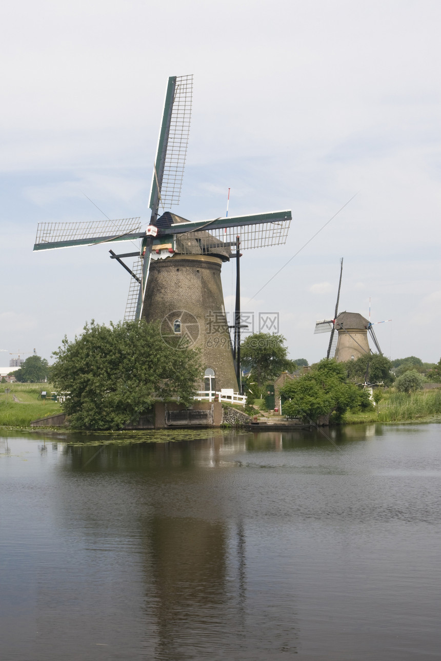 荷兰风车和运河旅行小孩农业旅游堤防图片