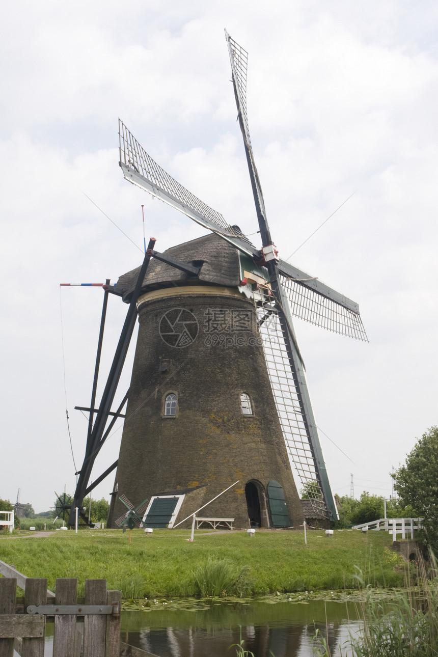 荷兰风车堤防旅行农业小孩旅游图片