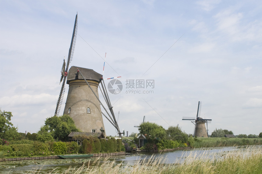 荷兰风车和运河旅游小孩旅行堤防农业图片