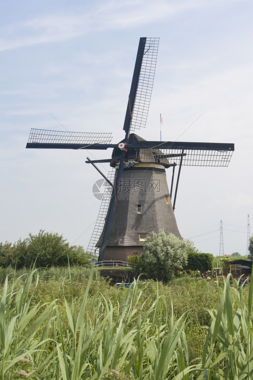 荷兰风车农业堤防旅行小孩旅游图片