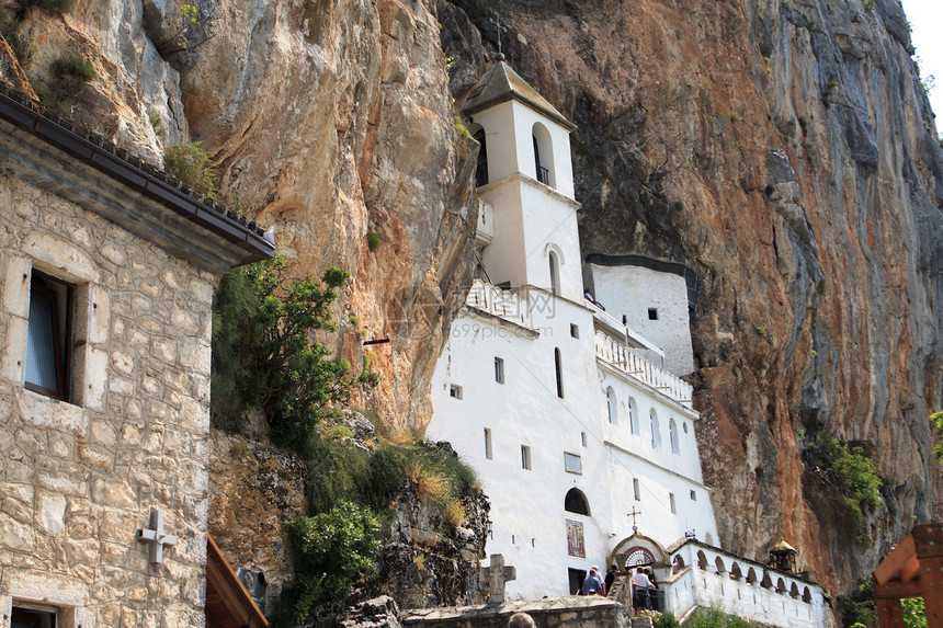 山区修道院建筑宗教岩石植物白色图片