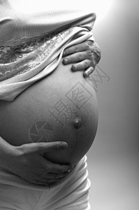 生儿育女睡衣母亲腹部身体母性手臂压痛婴儿大肚腩女士背景图片