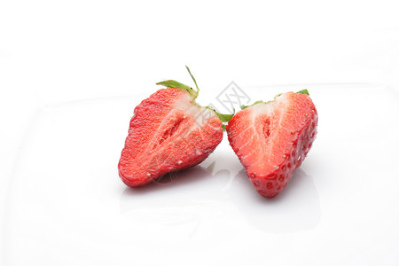 草莓绿色养分饮食反射健康饮食杂货横截面美食家红色宏观背景图片
