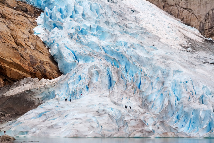 爬上冰川高山蓝色活动运动风险探索冒险绳索勘探团体图片