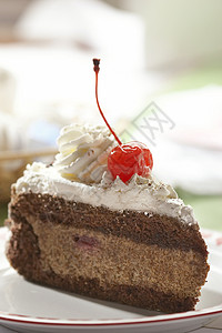 蛋糕花絮糖果美味沙漠食物红色甜蜜甜品盘子奶油背景图片