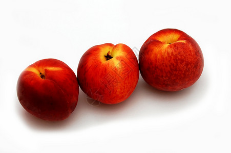 三个桃子维生素早餐营养红色黄色水果饮食背景图片