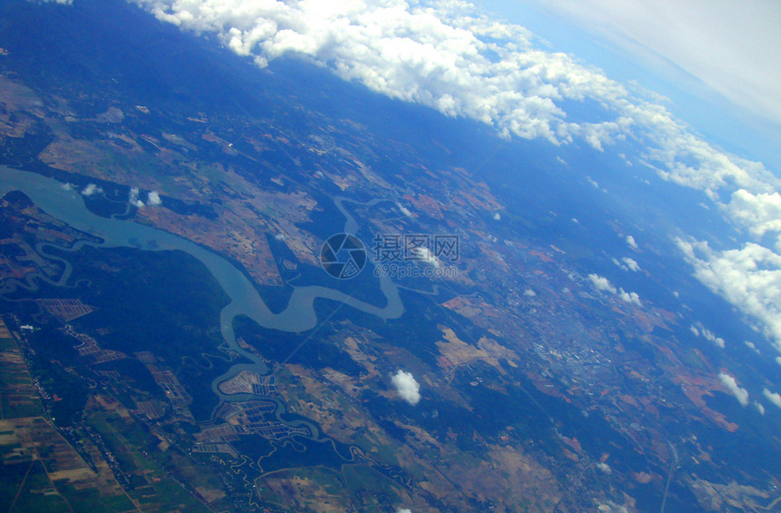 地球地土蓝色空气环境自由海洋愿望风景气象多云飞行图片