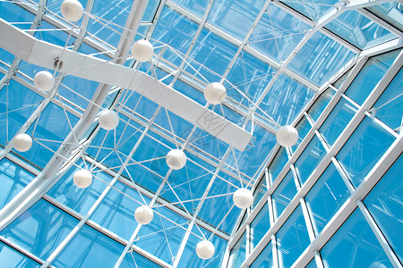 玻璃和金属制造天空蓝色摩天大楼商业中心平台亮度车站建造城市背景图片