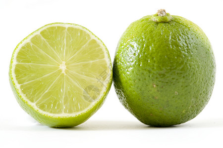 石灰绿色新鲜绿石灰宏观食物水果活力柠檬绿色背景