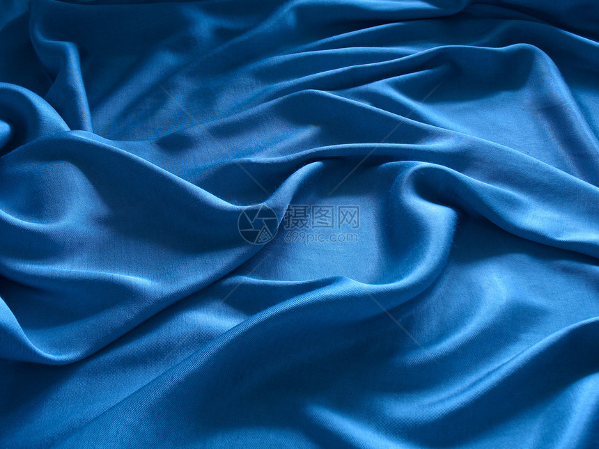 丝绸背景摘要纺织品曲线折叠柔软度材料蓝色图片