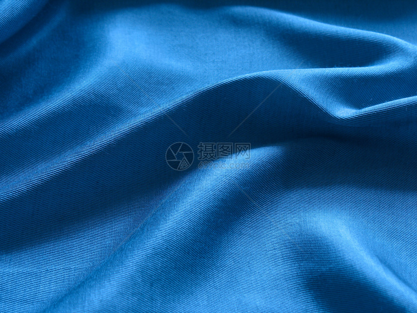 丝绸背景摘要柔软度曲线折叠蓝色材料纺织品图片