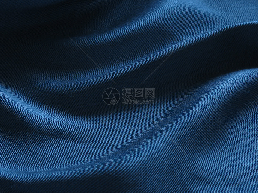 蓝丝绸背景摘要纺织品蓝色材料折叠柔软度曲线图片