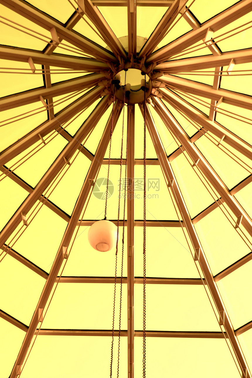 玻璃天花板城市框架太阳黄色窗户曲线建筑日落天空金子图片