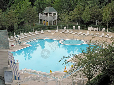 游泳池水池休闲座位活动闲暇运动酒店背景图片