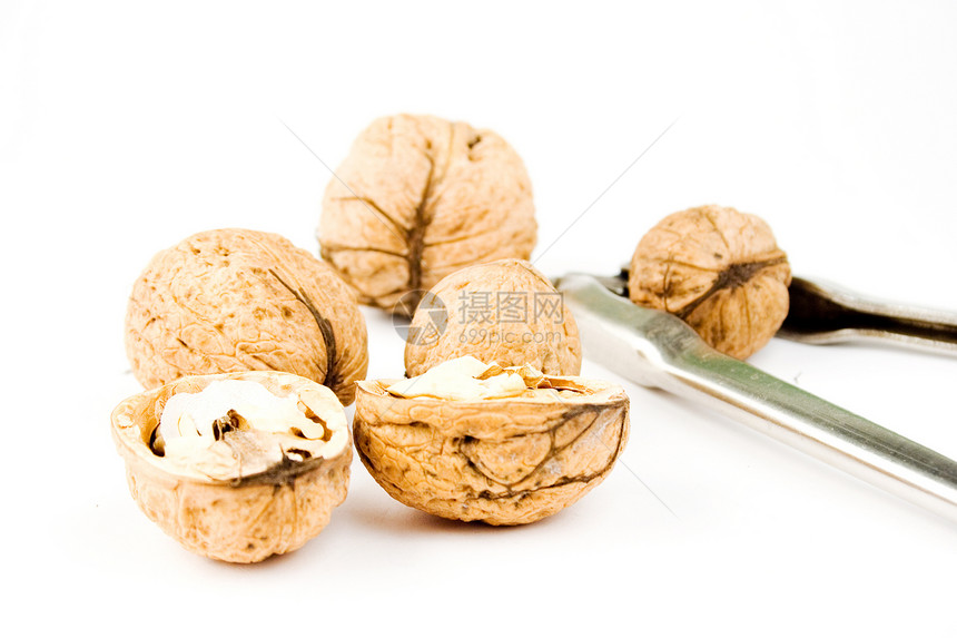 与分离的坚果混在一起的胡桃水果营养棕色小吃烹饪甜点饼干味道食物季节性图片