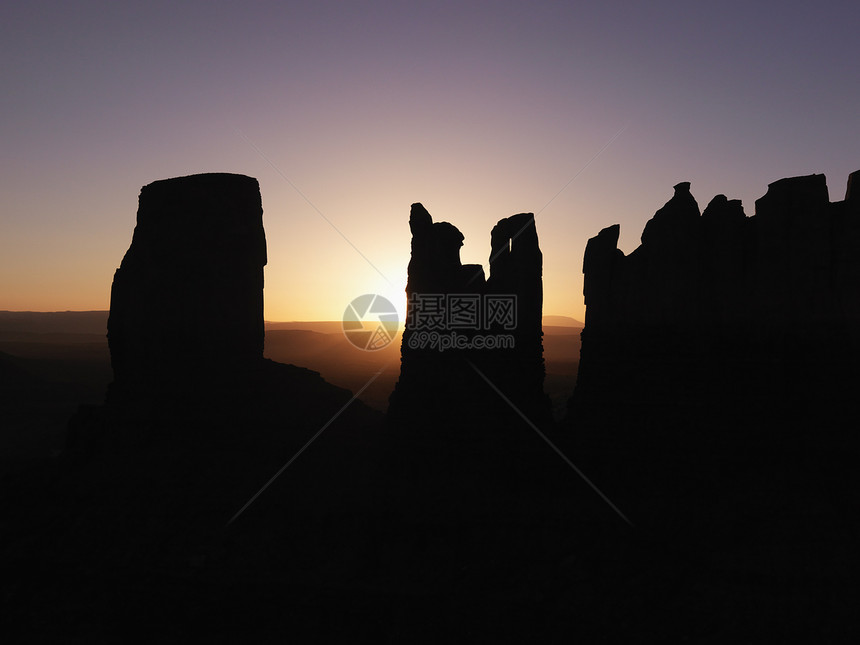 古迹谷地的日落景色旅行照片天空台面峡谷岩石沙漠太阳风景日出图片