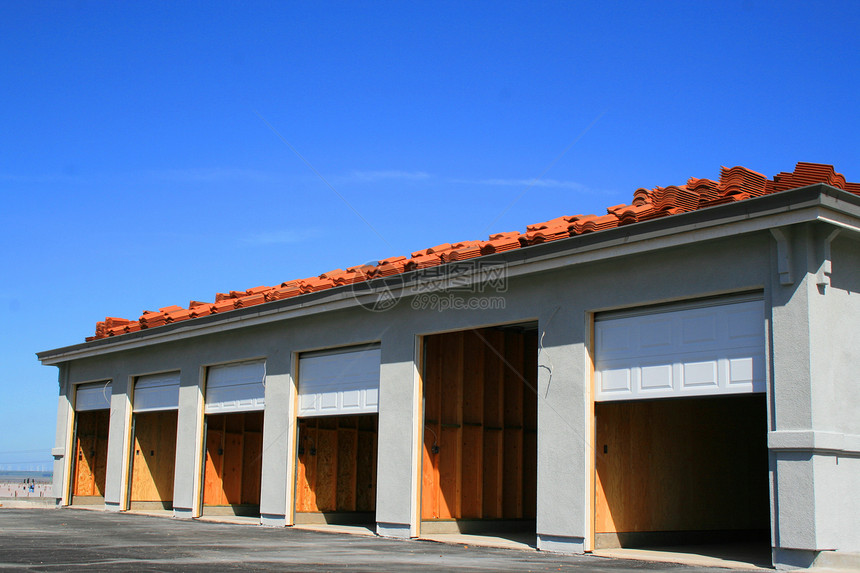 正在建造的停车场楼大楼石头天空木头院子水泥品牌建筑白色入口工业图片