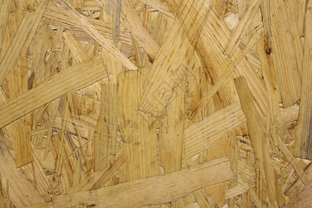 压缩木木头控制板材料棕色黄色背景图片