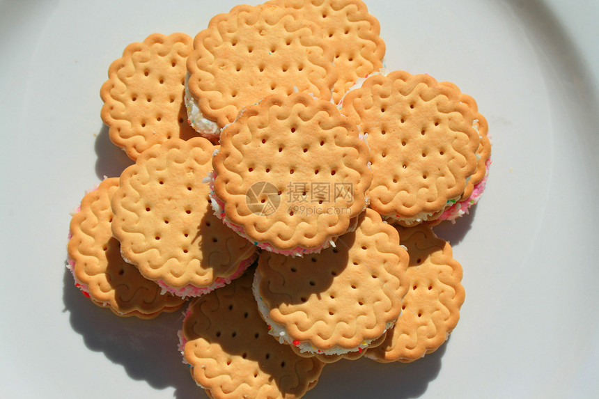 棉花糖甜点在一块盘子上面团纹理食物面包糕点蛋糕饼干拼盘粉色白色图片