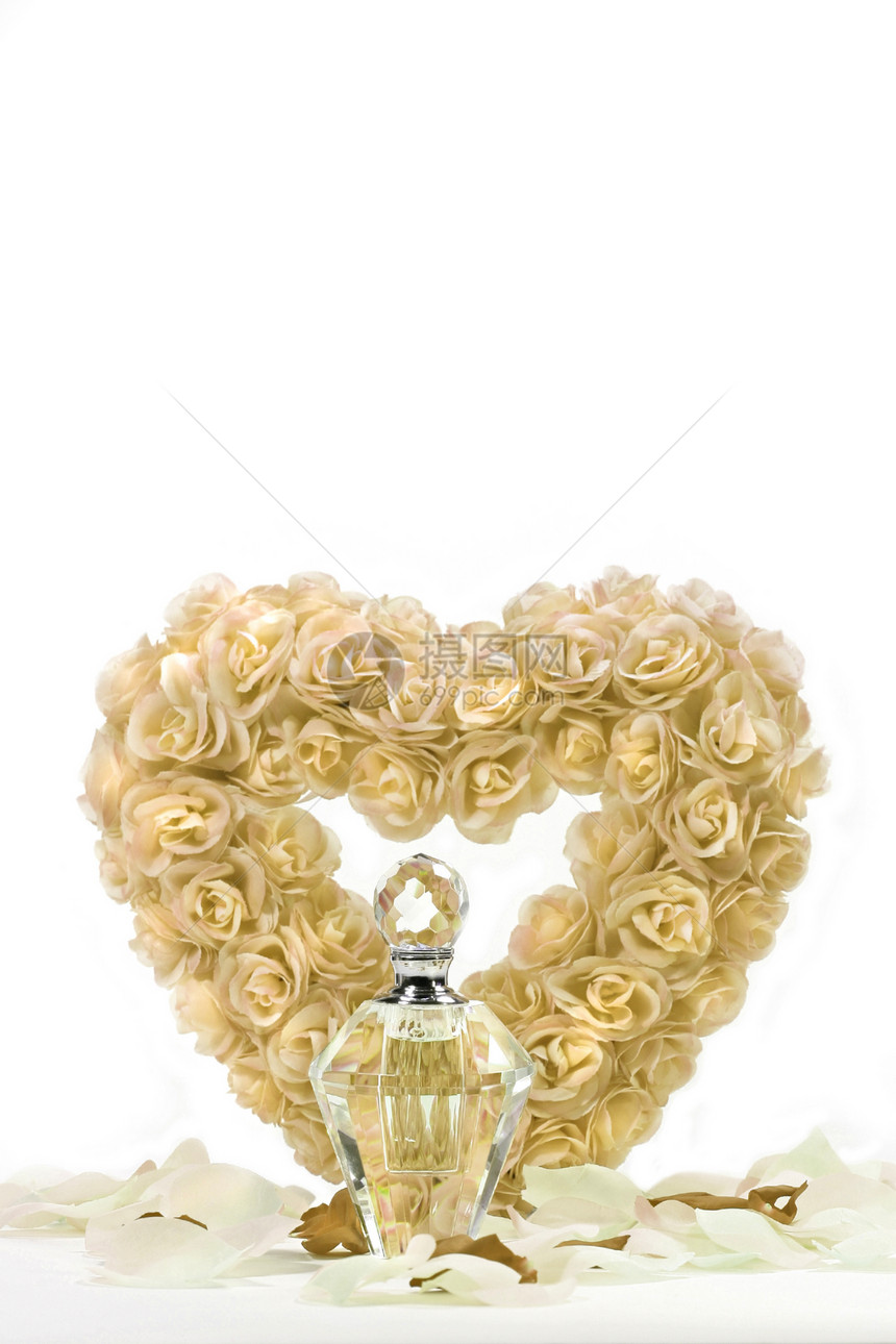 玫瑰心与水晶瓶花瓣香水瓶子妈妈们生日展示热情火花花束礼物图片
