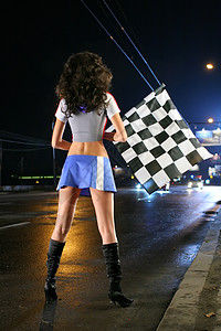 赛车格子旗带有普列旗的女孩背景