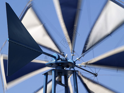 平轮轴承蓝色车削风力灌溉运动白色背景图片