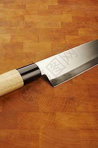 砍柴刀刀子木头劈柴用具厨房金属厨具背景