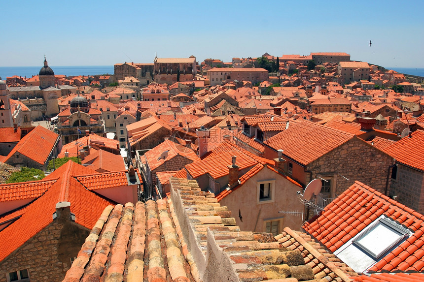 旧的橙色屋顶瓷砖材料建筑学黏土制品港口红陶历史性支撑卵石城市图片