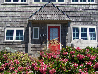 海滩别墅震动房子红门家门背景图片