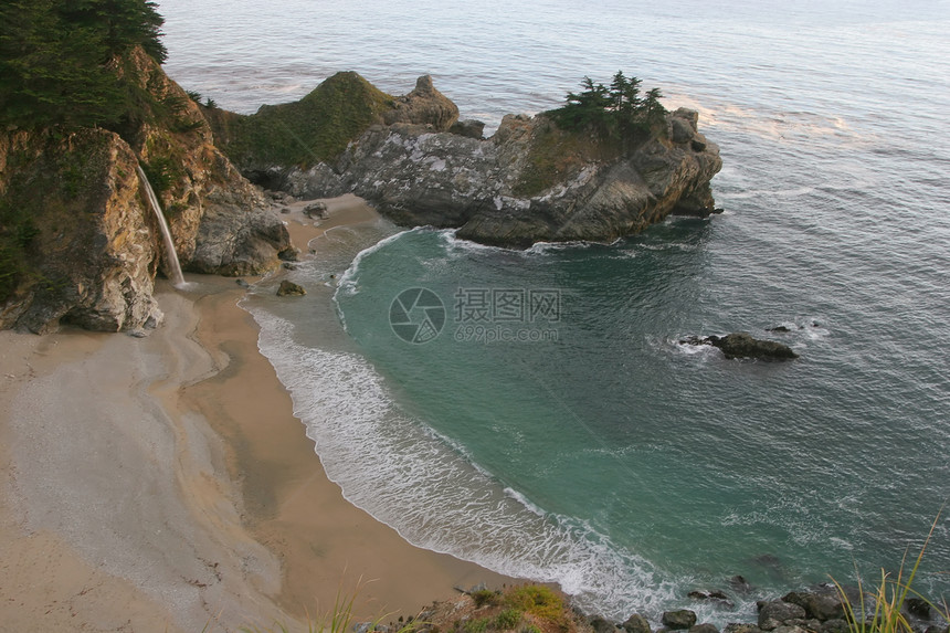 大南旅行波浪顶峰岩石日落海岸瀑布游客沿海操作图片