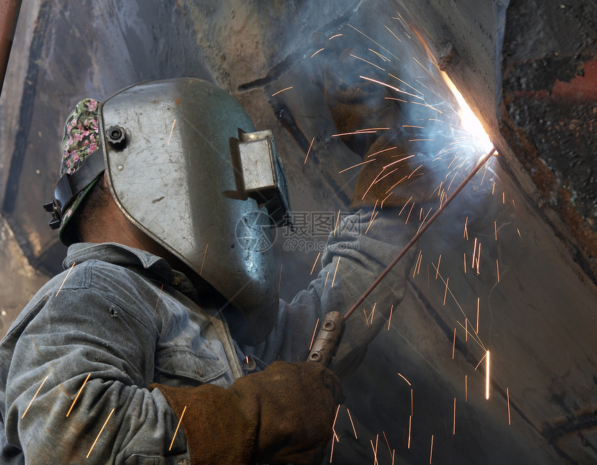 焊焊工劳动工作面具男人金属生产火焰安全火炬焊机图片