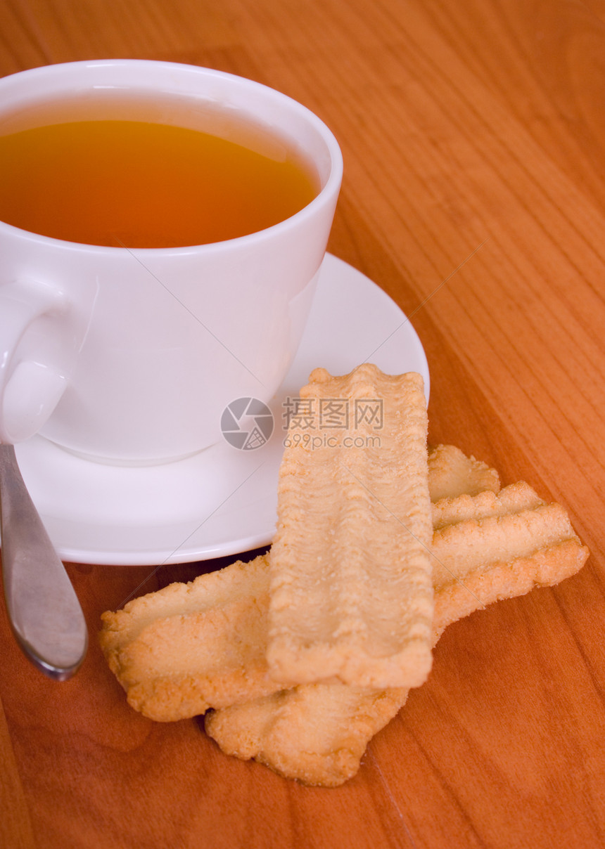 茶杯和饼干陶瓷盘子饮料补品奢华勺子面包早餐芳香桌子图片