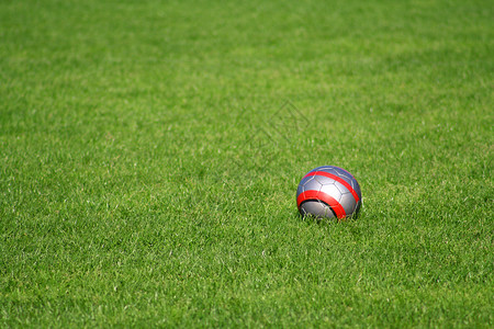 足球球场黑色红色灰色草地运动绿色体育场背景图片