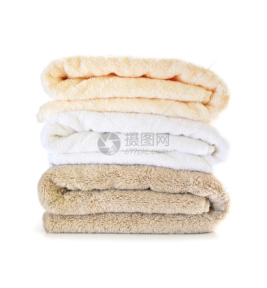 一堆毛巾折叠棉布呵护奢华淋浴白色棕色柔软度桑拿浴室图片