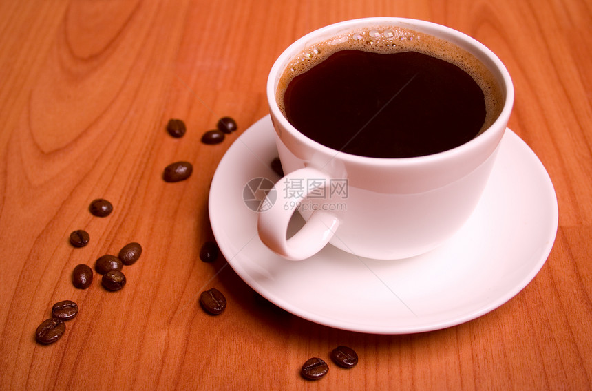 咖啡和大豆豆子木头桌子兴奋剂营养力量闲暇种子粮食活力图片