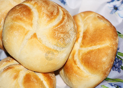 新鲜烤面包卷棕色早餐馒头面包食物包子背景图片